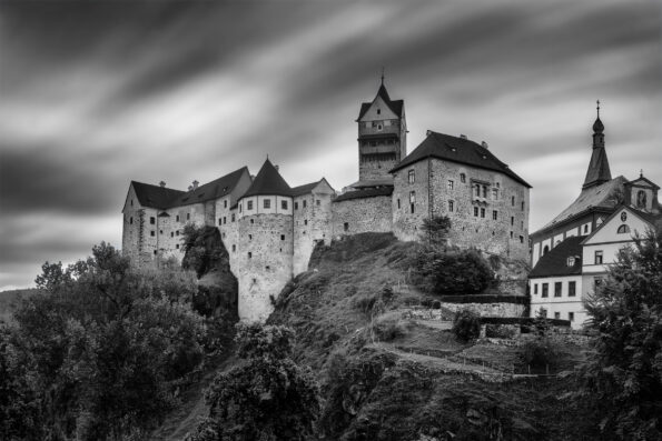 Loket Castle is a 12th-century Gothic style castle about 12 kilometres from Karlovy Vary on a massive rock in the town of Loket
